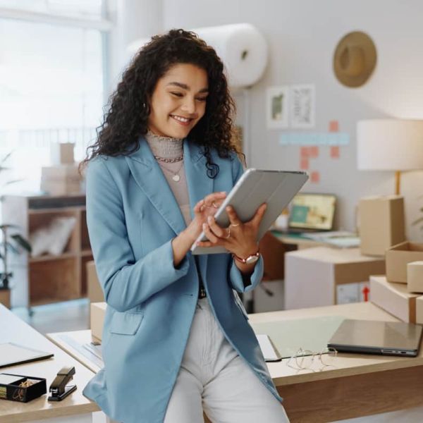 businesswoman on tablet at work