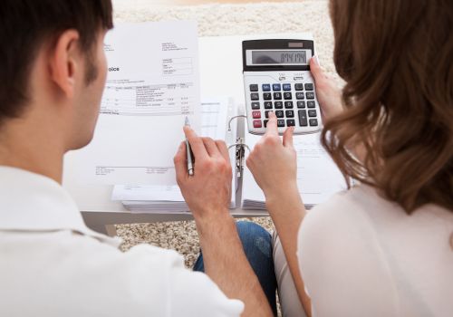 Two people creating a budget