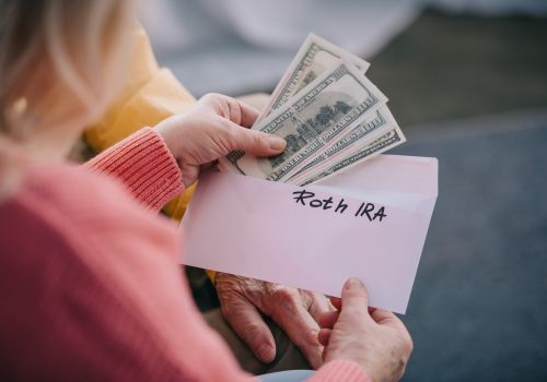 Woman opening envelope