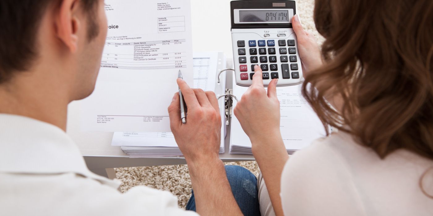 Two people creating a budget